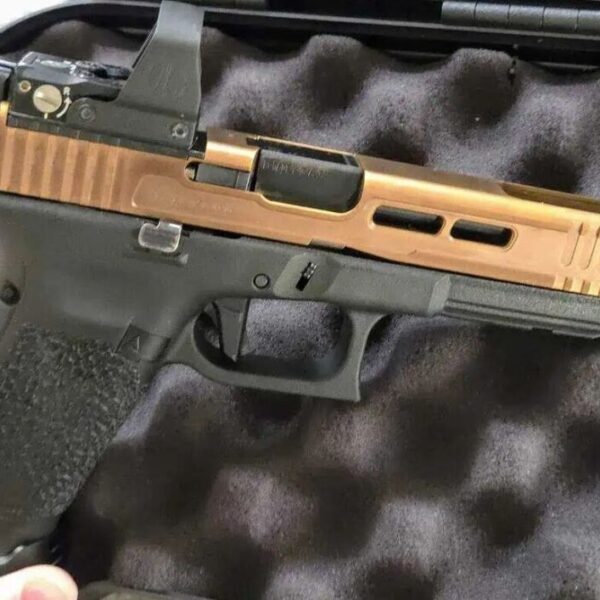 Kaufen Sie eine individuell angepasste Glock 34 Gen5 (9 mm) mit Deltapoint Pro Copperhead